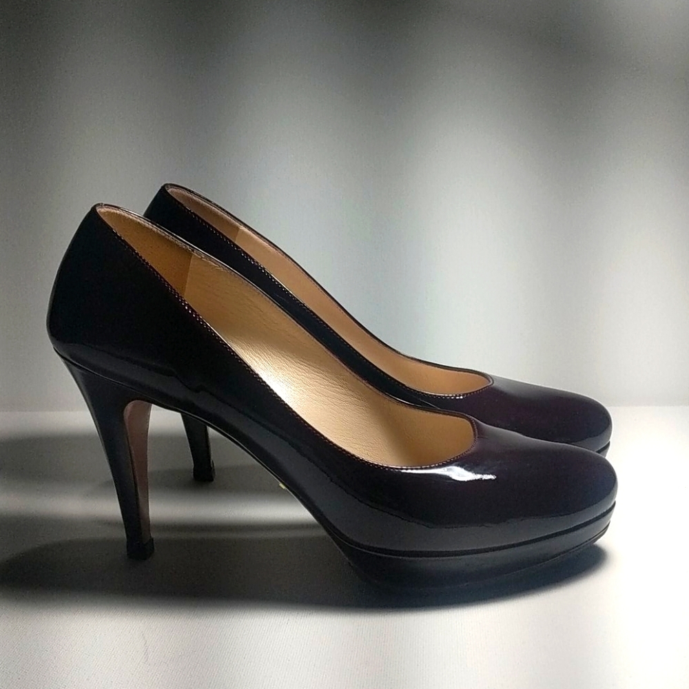 Prada oxblood platform patent leather pumps